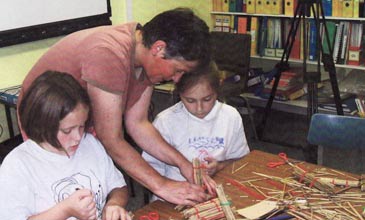 Artwarblers making small reed structures with Sarah